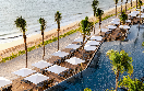 hilton cancun beach aerial pool view chairs