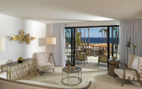 PARADISUS LOS CABOS THE RESERVE DELUXE OCEAN FRONT MASTER SUITE LIVING ROOM 